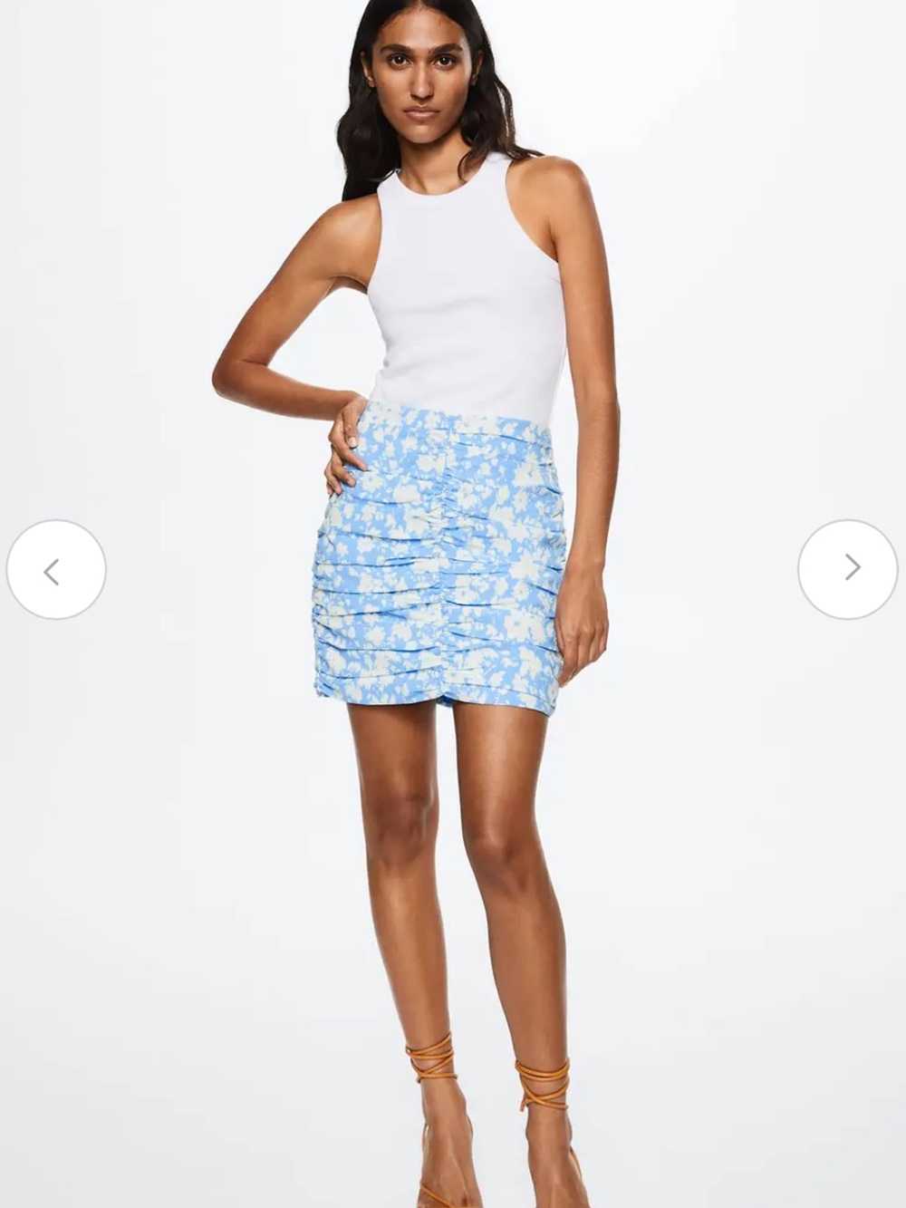 27. NWT MNGO Blue Floral Ruched Mini Skirt